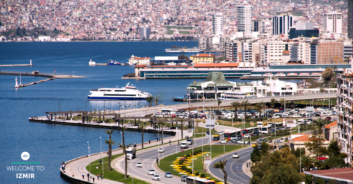 aerial view of Izmir skyline with houses at distance and body of water